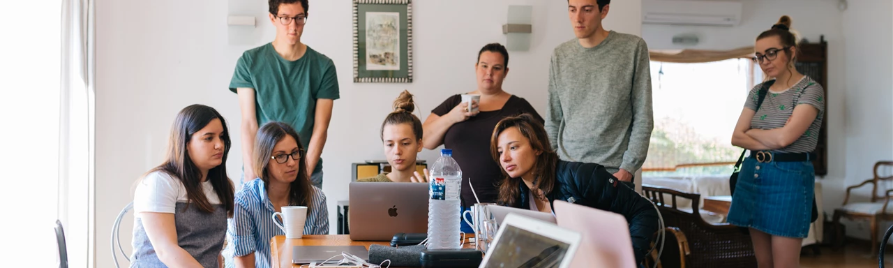 Group of People Watching on Laptop